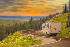 How do I handle crosswinds while driving an RV?