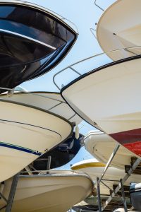 Are there any regulations or permits required for boat storage in certain areas?