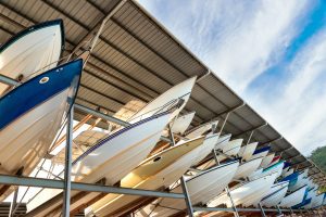 What precautions should I take to prevent mildew and mould in my boat during storage?